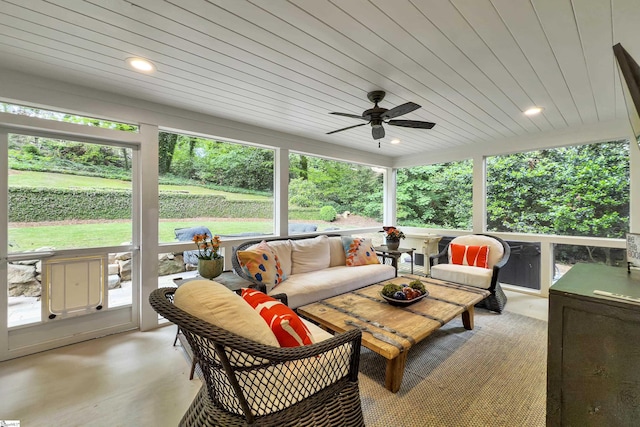 sunroom / solarium with an outdoor hangout area and a ceiling fan