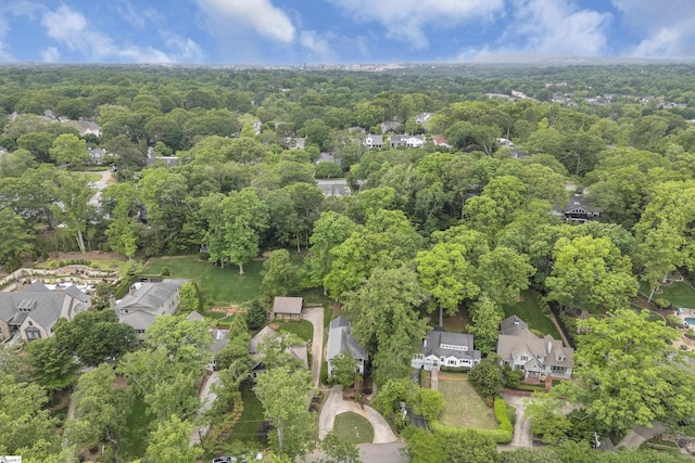 bird's eye view featuring a residential view and a view of trees