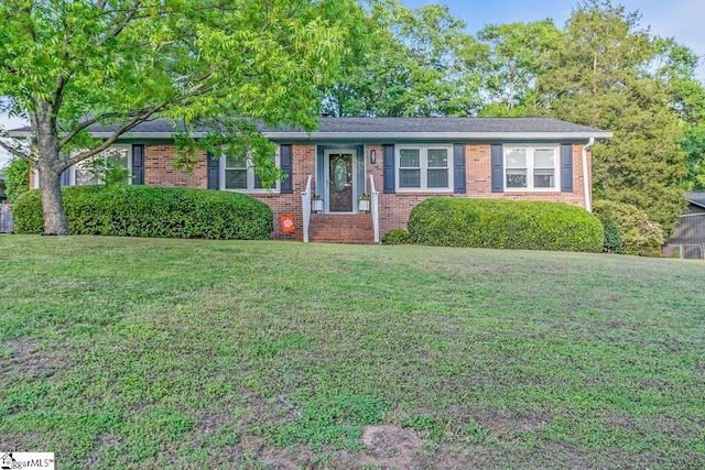 207 Tollgate Rd, Simpsonville, SC 29681 - ranch-style home with brick siding and a front yard