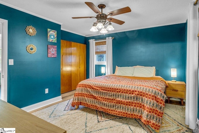 207 Tollgate Rd, Simpsonville, SC 29681 - bedroom featuring a ceiling fan, wood finished floors, baseboards, a closet, and ornamental molding