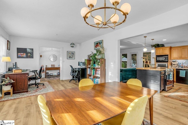 207 Tollgate Rd, Simpsonville, SC 29681 - dining room featuring an inviting chandelier, a healthy amount of sunlight, and light wood finished floors