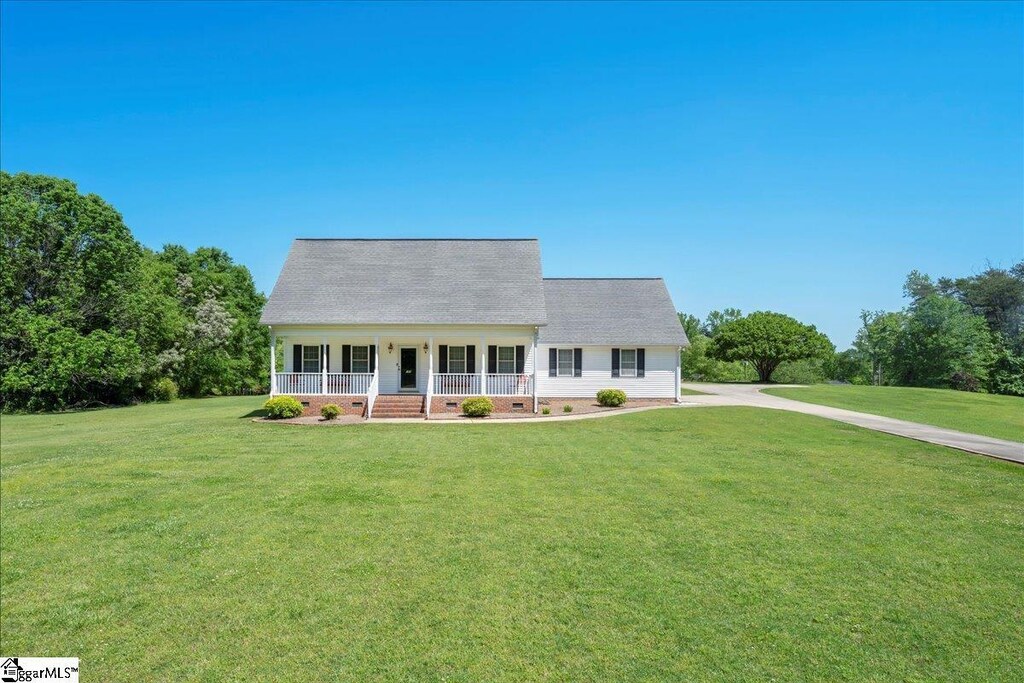 168 Edgewood Rd, Easley, SC 29642 - cape cod-style house featuring a front lawn, roof with shingles, covered porch, and crawl space