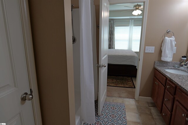 502 E Heatherstone Ln, Roebuck, SC 29376 - bathroom featuring ceiling fan, a shower with shower curtain, and vanity