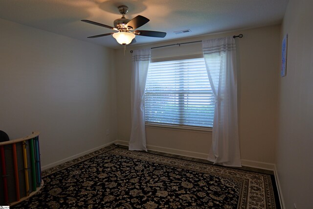 502 E Heatherstone Ln, Roebuck, SC 29376 - empty room featuring baseboards, a ceiling fan, and visible vents