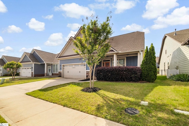180 Bur Oak Dr, Taylors, SC 29687 - craftsman-style house featuring an attached garage, a front lawn, and board and batten siding