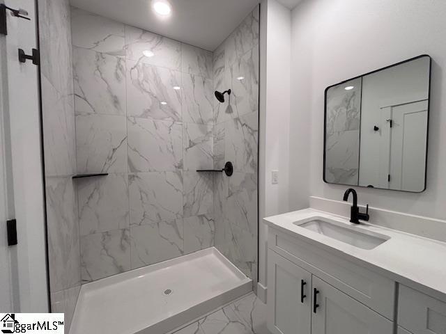 550 Vault Way, Roebuck, SC 29376 - full bathroom featuring vanity, marble finish floor, and a marble finish shower