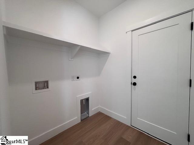 550 Vault Way, Roebuck, SC 29376 - laundry area with laundry area, washer hookup, baseboards, hookup for an electric dryer, and dark wood-style floors