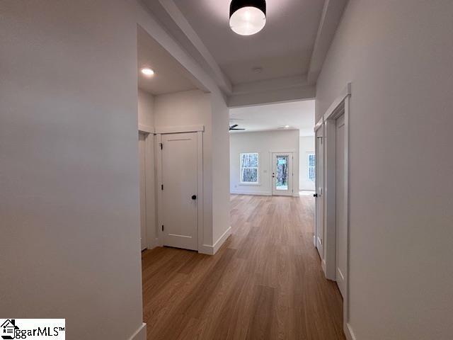 550 Vault Way, Roebuck, SC 29376 - hallway featuring baseboards and wood finished floors
