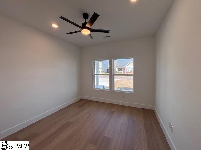 550 Vault Way, Roebuck, SC 29376 - empty room with ceiling fan, visible vents, wood finished floors, baseboards, and recessed lighting