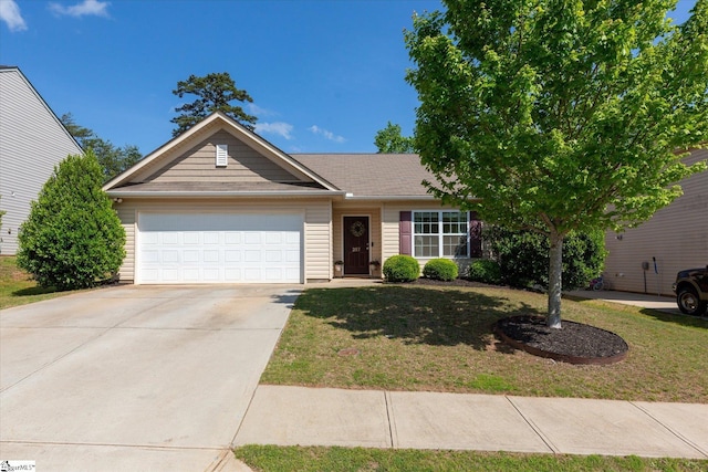 ranch-style home with an attached garage, a front yard, and concrete driveway