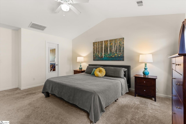 bedroom with visible vents, carpet flooring, and lofted ceiling