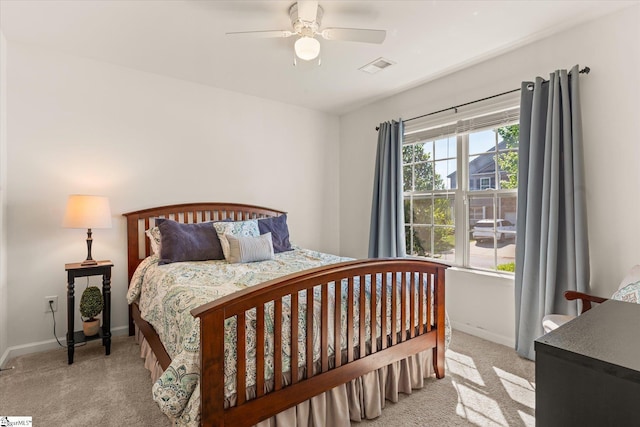 bedroom featuring visible vents, carpet, ceiling fan, and baseboards