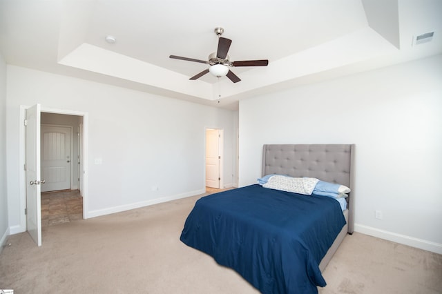 920 Ravenfield Dr, Duncan, SC 29334 - bedroom featuring baseboards, a raised ceiling, visible vents, and light carpet