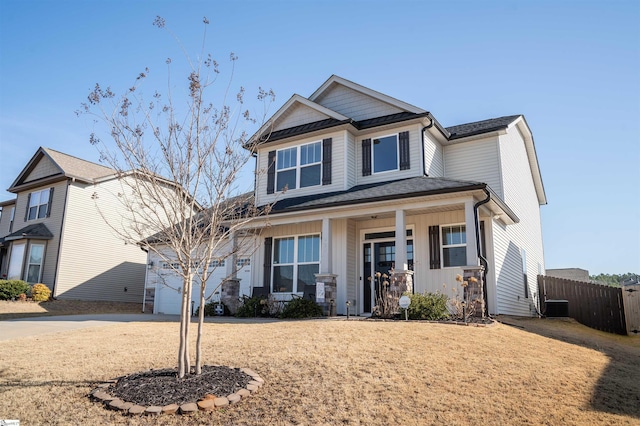 920 Ravenfield Dr, Duncan, SC 29334 - craftsman-style house with board and batten siding, a porch, central AC, fence, and concrete driveway