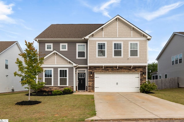 craftsman-style house with an attached garage, fence, driveway, and stone siding