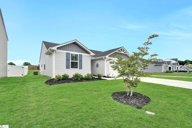 124 Highland Station Dr, Clinton, SC 29325 - single story home with board and batten siding, concrete driveway, and a garage