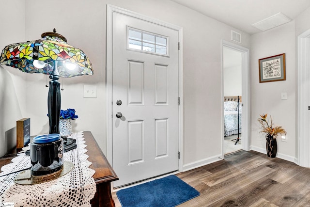124 Highland Station Dr, Clinton, SC 29325 - foyer with dark wood-style flooring, plenty of natural light, and baseboards
