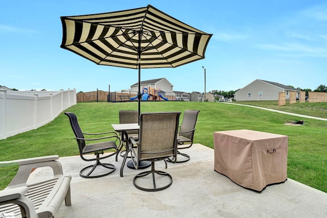 124 Highland Station Dr, Clinton, SC 29325 - view of patio / terrace featuring a playground and outdoor dining area
