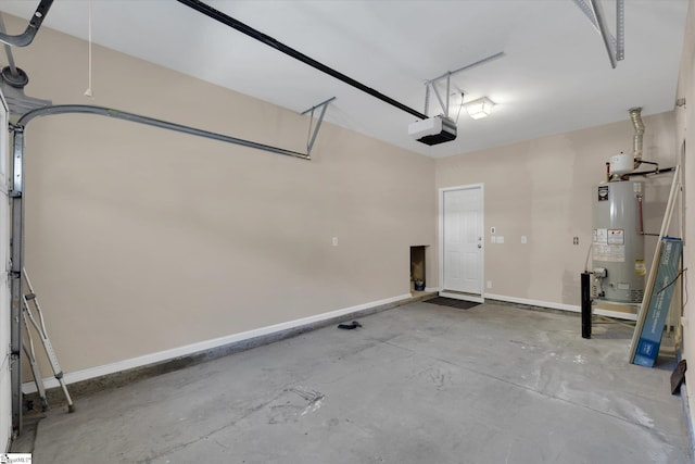 garage featuring baseboards, a garage door opener, and gas water heater