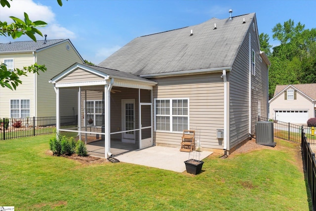 rear view of property featuring a sunroom, a fenced backyard, central air condition unit, a patio, and a lawn