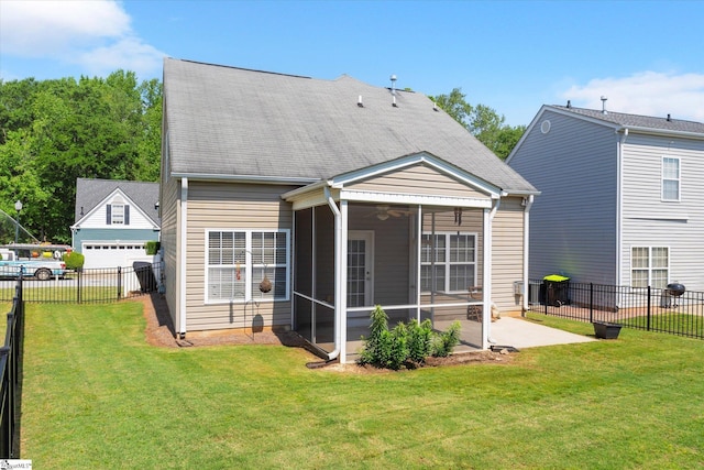 back of property with ceiling fan, a patio area, a sunroom, a fenced backyard, and a yard