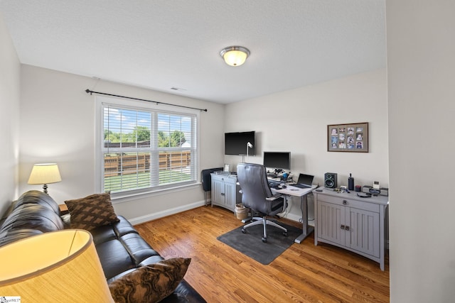 327 Terra Plains Dr, Greer, SC 29651 - home office featuring baseboards, visible vents, and light wood-style floors