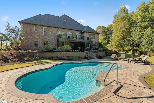 155 Tyger Farm Ln, Woodruff, SC 29388 - pool with stairs, a wooden deck, and a patio