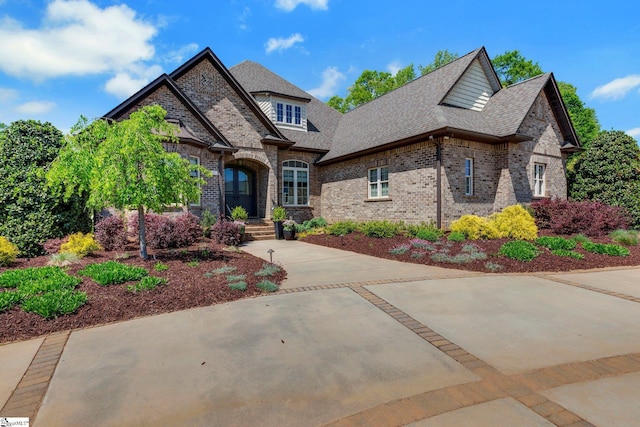 155 Tyger Farm Ln, Woodruff, SC 29388 - view of front facade featuring brick siding and roof with shingles