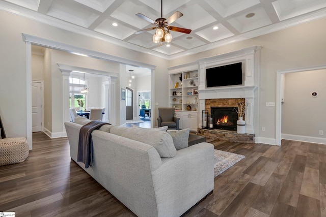 155 Tyger Farm Ln, Woodruff, SC 29388 - living area featuring a ceiling fan, dark wood-style floors, a fireplace, and beamed ceiling