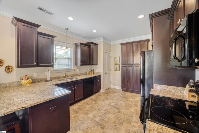 127 Alberta Cir, Piedmont, SC 29673 - kitchen with crown molding, light stone counters, a sink, visible vents, and black appliances
