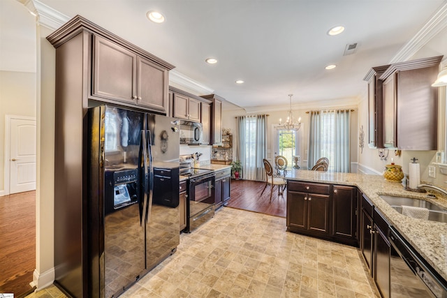 127 Alberta Cir, Piedmont, SC 29673 - kitchen featuring visible vents, a sink, black appliances, a notable chandelier, and ornamental molding