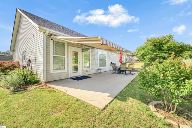 127 Alberta Cir, Piedmont, SC 29673 - back of house with a lawn, a patio, and roof with shingles