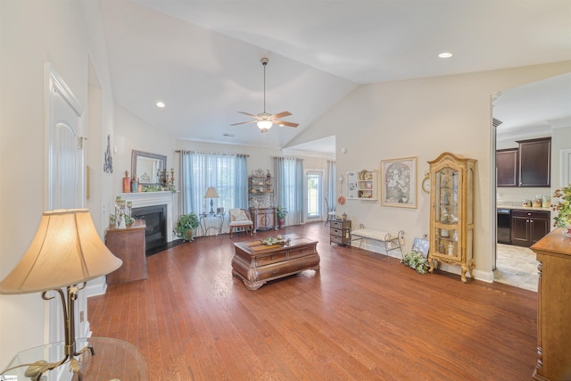 127 Alberta Cir, Piedmont, SC 29673 - living area featuring ceiling fan, a fireplace with flush hearth, wood finished floors, and lofted ceiling