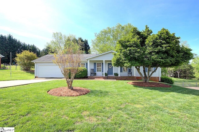 ranch-style home with fence, a garage, a porch, a front yard, and driveway