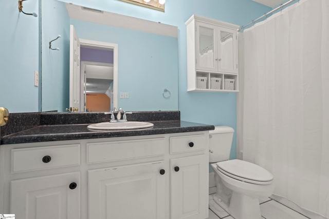 full bath with vanity, visible vents, toilet, a shower with shower curtain, and tile patterned floors