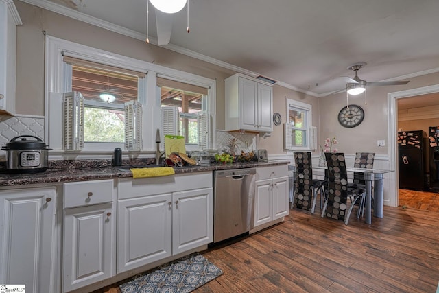 kitchen with stainless steel dishwasher, a ceiling fan, ornamental molding, and a sink