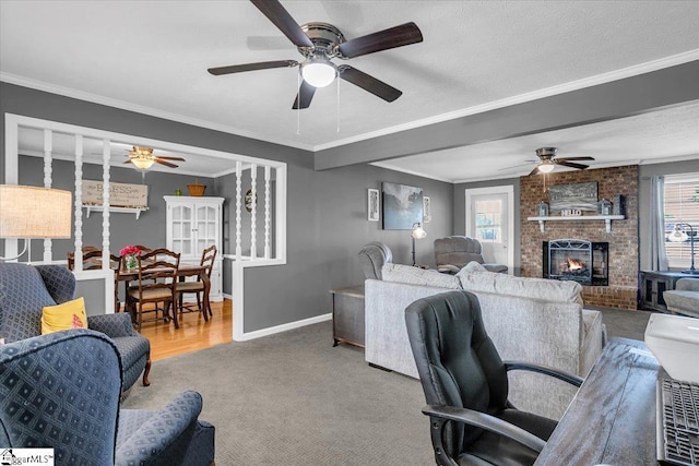 office space featuring baseboards, carpet flooring, ceiling fan, and a healthy amount of sunlight