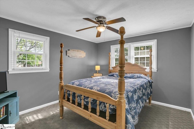 carpeted bedroom featuring crown molding, baseboards, and multiple windows