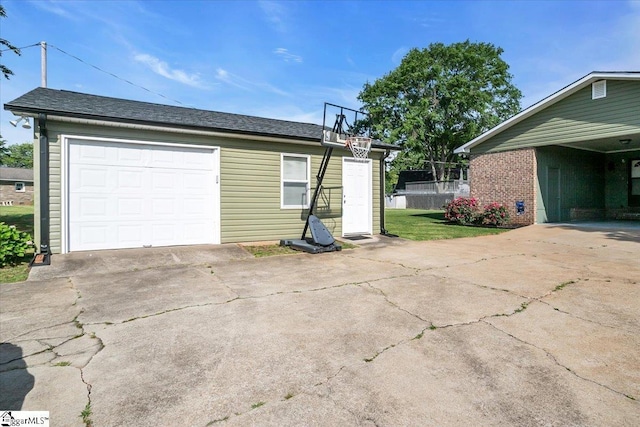 view of property exterior with concrete driveway