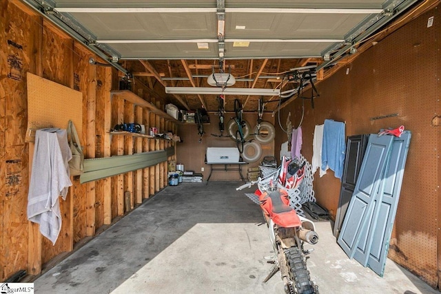 garage featuring a garage door opener
