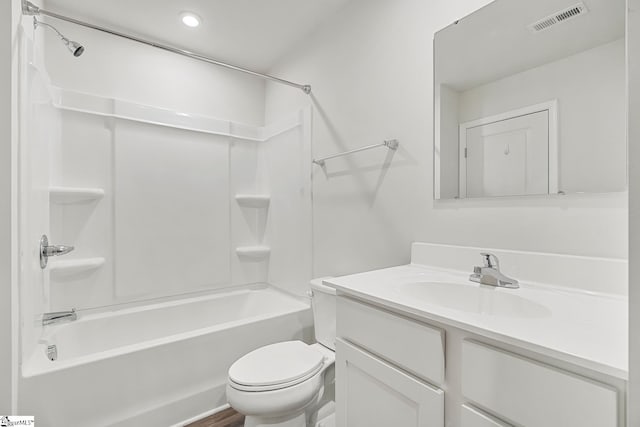 bathroom featuring tub / shower combination, vanity, toilet, and visible vents