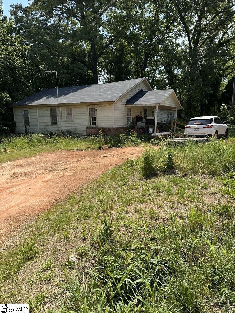 1703 Coffee Rd, Westminster, SC 29693 - view of front facade with dirt driveway