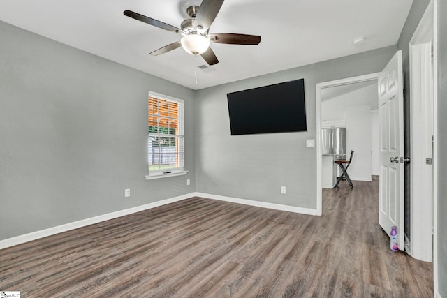 232 Ashley Danielle Dr, Duncan, SC 29334 - unfurnished bedroom with baseboards, a ceiling fan, wood finished floors, and visible vents