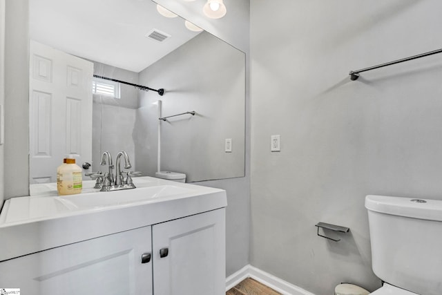 232 Ashley Danielle Dr, Duncan, SC 29334 - bathroom featuring visible vents, baseboards, toilet, and vanity