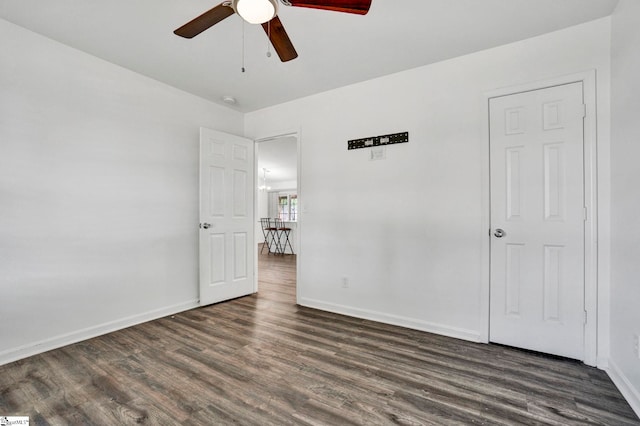 232 Ashley Danielle Dr, Duncan, SC 29334 - unfurnished bedroom with baseboards, dark wood-style flooring, and ceiling fan
