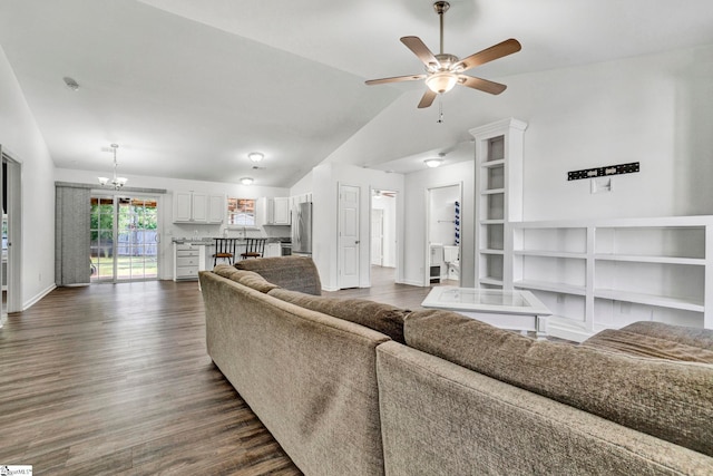 232 Ashley Danielle Dr, Duncan, SC 29334 - living room featuring baseboards, lofted ceiling, dark wood-style floors, and ceiling fan with notable chandelier