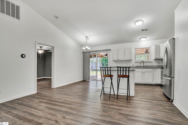 232 Ashley Danielle Dr, Duncan, SC 29334 - kitchen with a sink, plenty of natural light, freestanding refrigerator, white cabinetry, and visible vents