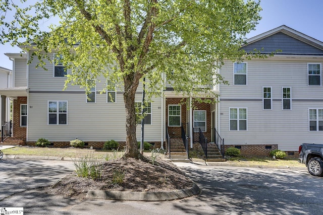 view of property featuring crawl space