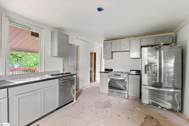 6 Liberty St, Piedmont, SC 29673 - kitchen with crown molding, dark countertops, appliances with stainless steel finishes, and gray cabinets
