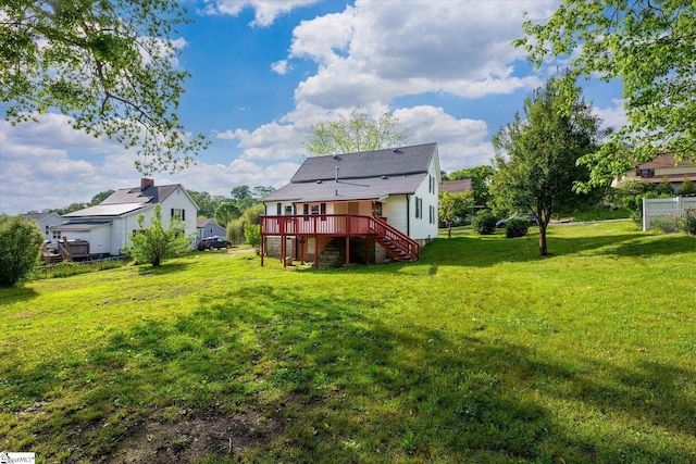 6 Liberty St, Piedmont, SC 29673 - rear view of house with stairway, a lawn, and a wooden deck